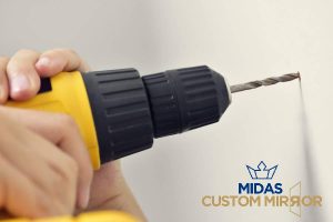 drilling-and-mounting-support-8-steps-taken-by-professionals-during-professional-custom-wall-mirror-installation-in-singapore-wall-mirror-midas-custom-mirror-singapore